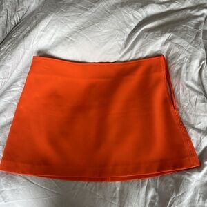 Orange mini skirt